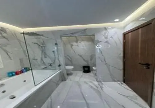 Vente-Luxueuse-Villa-450m²-avec-jardin-et-piscine
